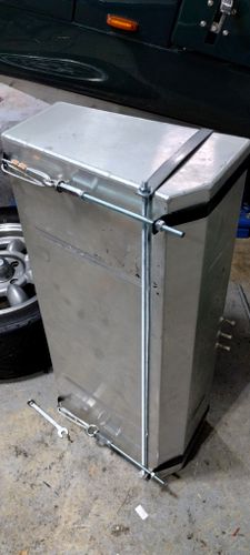 Fuel tank contained within the brackets